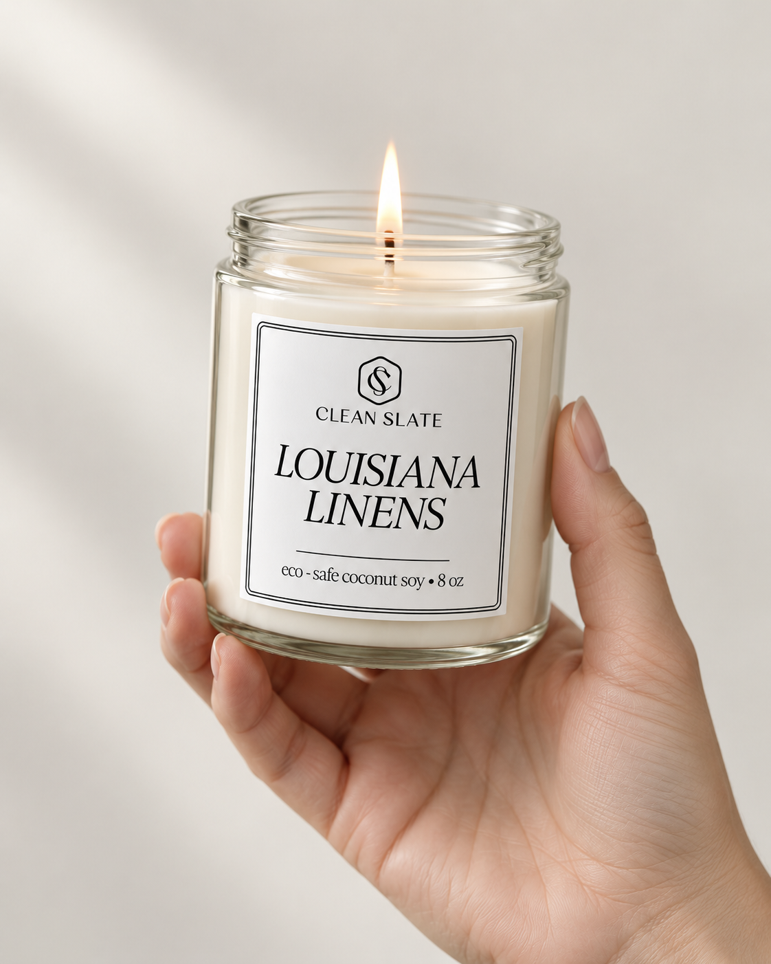 Louisiana Linens candle lit in hand